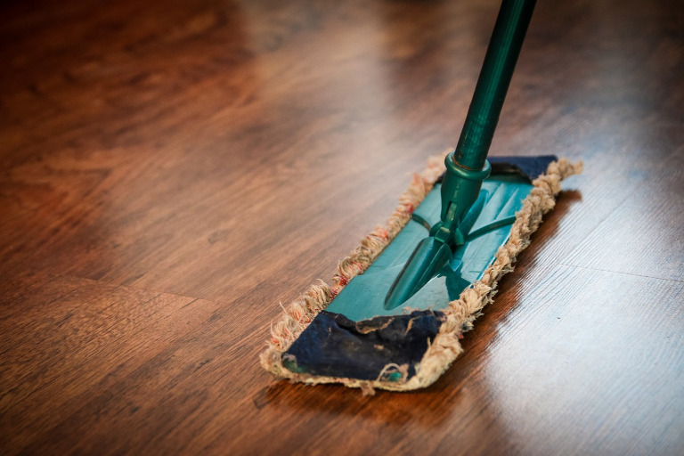 deep cleaning Moorside mopping the floor